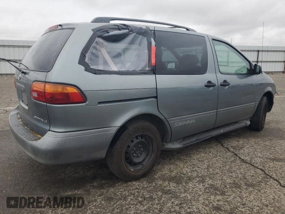 2000 Toyota Sienna LE with VIN 4T3ZF13C2YU217185, listed as a Copart auction lot 82407944 with 244,381 mi miles and Salvage Title. Bid and sale history available at DreamBid. Image 3.