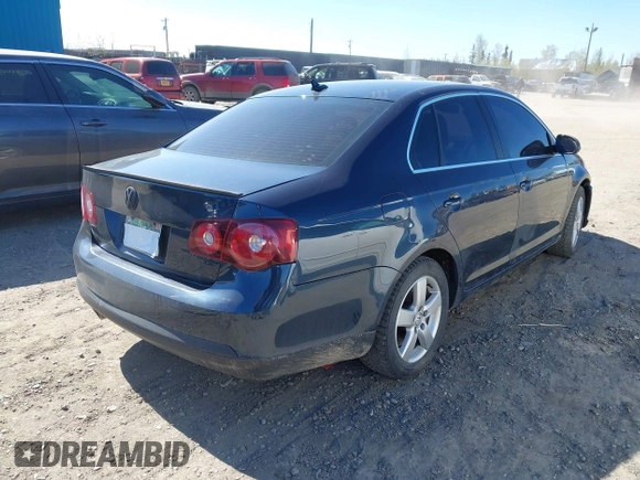 2009 Volkswagen Jetta SE with VIN 3VWRZ71K19M122492, listed as a IAAI auction lot 42270119 with 107,040 mi miles and . Bid and sale history available at DreamBid. Image 4.