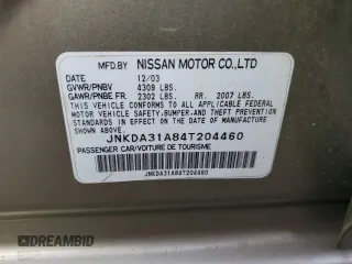 2004 Infiniti I35 z VIN JNKDA31A84T204460, wystawiony jako Copart lot #78439394 z przebiegiem 197 201 mil mil oraz Szkoda całkowita • Salvage title. Historia ofert i sprzedaży dostępna na DreamBid. Obrazek 14.