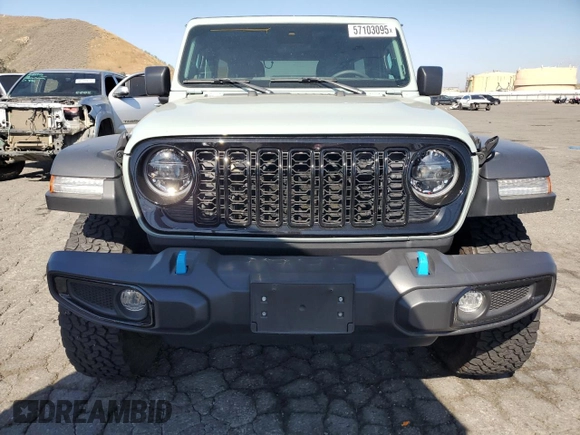 2024 Jeep Wrangler Sport S with VIN 1C4RJXN63RW142251, listed as a Copart auction lot 57103095 with 30,111 mi miles and Salvage title. Bid and sale history available at DreamBid. Image 5.