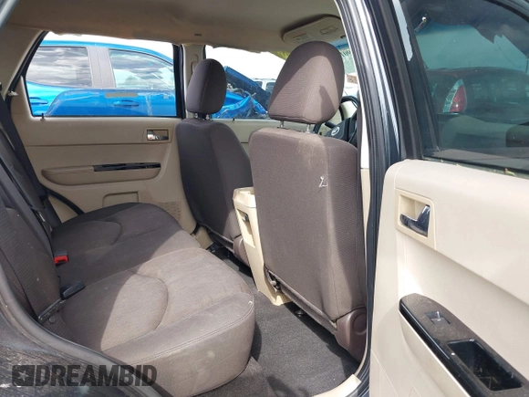 2008 Mazda Tribute ES with VIN 4F2CZ06188KM01024, listed as a IAAI auction lot 41890148 with 122,367 mi miles. Bid and sale history available at carsss.com. Image 8.