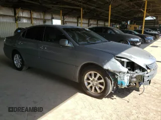 2002 Lexus ES 300 with VIN JTHBF30G720079044, listed as a Copart auction lot 59610445 with 145,310 mi miles and Salvage title. Bid and sale history available at DreamBid. Image 4.