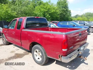 1999 Ford F-150 with VIN 1FTZX1725XKA41044, listed as a IAAI auction lot 42446146 with Not provided miles and . Bid and sale history available at DreamBid. Image 3.