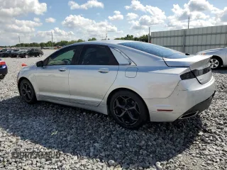2013 Lincoln MKZ z VIN 3LN6L2G94DR820729, wystawiony jako Copart lot #53243145 z przebiegiem 111 753 mil mil oraz Szkoda całkowita • Salvage title. Historia ofert i sprzedaży dostępna na DreamBid. Obrazek 2.