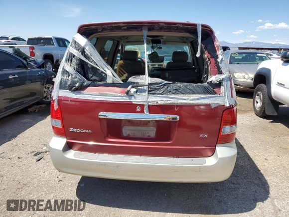 2003 Kia Sedona LX with VIN KNDUP131X36347280, listed as a Copart auction lot 66036964 with 0 mi miles and Salvage Title. Bid and sale history available at carsss.com. Image 6.