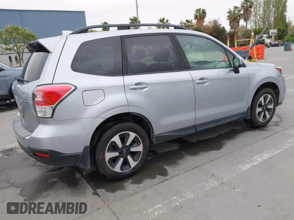2018 Subaru Forester Premium with VIN JF2SJAGC0JH611355, listed as a IAAI auction lot 42062683 with 111,109 mi miles. Bid and sale history available at carsss.com. Image 4.