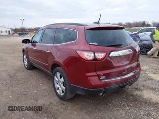 2016 Chevrolet Traverse LTZ z VIN 1GNKVJKD8GJ167038, wystawiony jako IAAI lot #41878254 z przebiegiem 159 771 mil mil oraz . Historia ofert i sprzedaży dostępna na DreamBid. Obrazek 3.