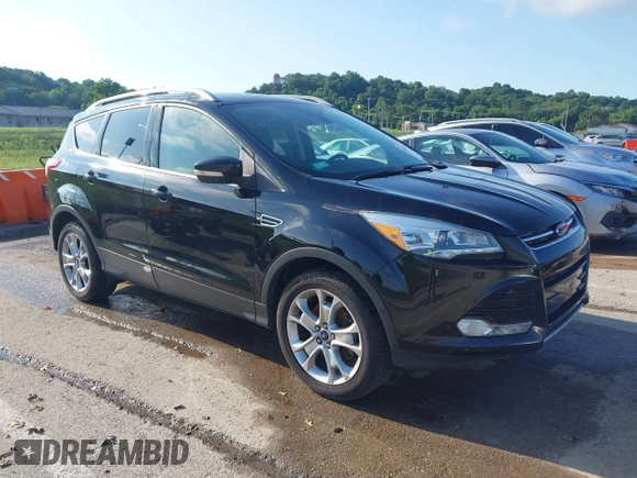 2016 Ford Escape Titanium with VIN 1FMCU9J97GUC21242, listed as a IAAI auction lot 42431567 with 96,946 mi miles and . Bid and sale history available at DreamBid. Image 1.