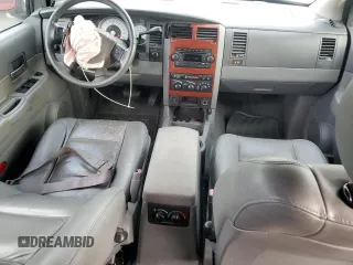 2005 Dodge Durango SLT z VIN 1D4HB48D05F566713, wystawiony jako Copart lot #84339944 z przebiegiem 190 851 mil mil oraz Szkoda całkowita • Salvage title. Historia ofert i sprzedaży dostępna na DreamBid. Obrazek 8.