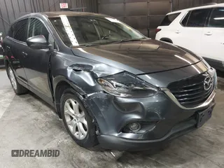 2013 Mazda CX-9 Touring z VIN JM3TB3CV0D0415199, wystawiony jako IAAI lot #42029040 z przebiegiem 154 404 mil mil oraz . Historia ofert i sprzedaży dostępna na DreamBid. Obrazek 1.