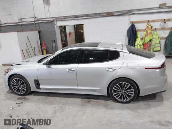 2018 Kia Stinger Premium with VIN KNAE25LA6J6021819, listed as a IAAI auction lot 41880827 with 119,214 mi miles. Bid and sale history available at carsss.com. Image 14.