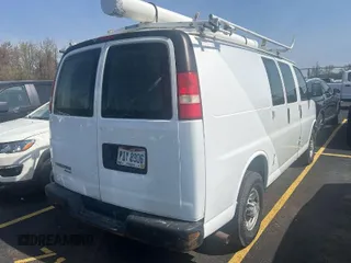 2015 Chevrolet Express Cargo Van with VIN 1GCWGFCF2F1180643, listed as a IAAI auction lot 42044863 with 253,011 mi miles. Bid and sale history available at carsss.com. Image 1.