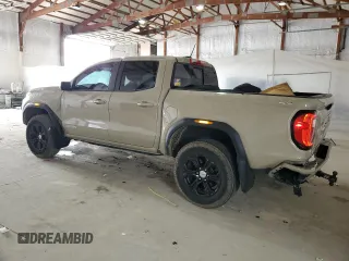 2023 GMC Canyon 4WD Elevation with VIN 1GTP6BEK3P1159232, listed as a Copart auction lot 50448225 with 76,770 mi miles and Salvage Title. Bid and sale history available at carsss.com. Image 2.