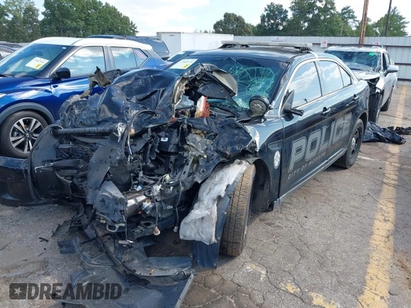 2014 Ford Police Interceptor z VIN 1FAHP2MT8EG154863, wystawiony jako IAAI lot #39828241 z przebiegiem 118 600 mil mil oraz . Historia ofert i sprzedaży dostępna na DreamBid. Obrazek 2.