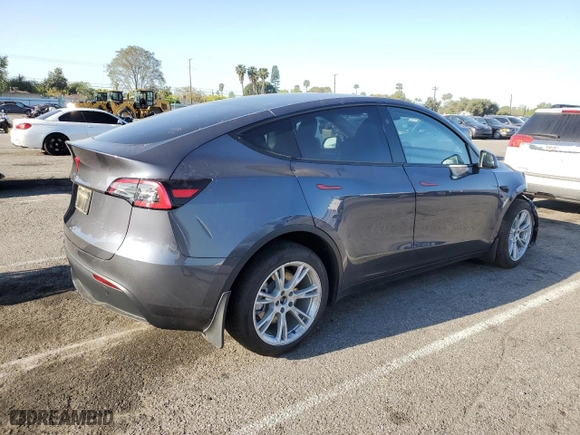 2023 Tesla Model Y Long Range with VIN 7SAYGDEE6PA189503, listed as a Copart auction lot 52542045 with 10,674 mi miles and Salvage Title. Bid and sale history available at carsss.com. Image 3.