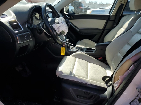 2016 Mazda CX-5 Grand Touring with VIN JM3KE4DYXG0781063, listed as a Copart auction lot 47099825 with 0 mi miles and Salvage Title. Bid and sale history available at carsss.com. Image 7.