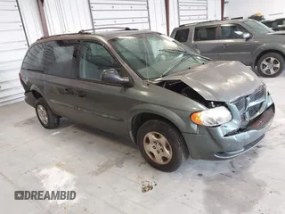 2003 Dodge Caravan SE with VIN 1D4GP24313B191319, listed as a IAAI auction lot 41398477 with 220,083 mi miles. Bid and sale history available at carsss.com. Image 1.