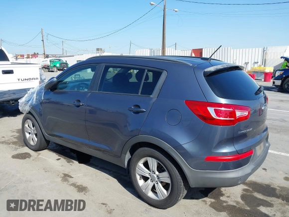 2011 Kia Sportage LX with VIN KNDPB3A23B7137650, listed as a IAAI auction lot 41979477 with 243,186 mi miles and . Bid and sale history available at carsss.com. Image 3.
