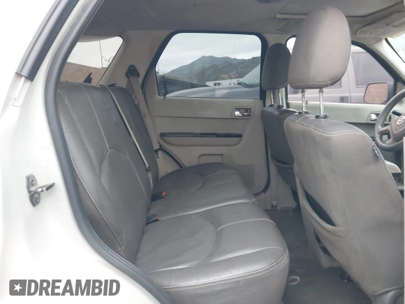 2008 Mazda Tribute Touring with VIN 4F2CZ961X8KM18007, listed as a IAAI auction lot 42035010 with 216,270 mi miles. Bid and sale history available at carsss.com. Image 8.