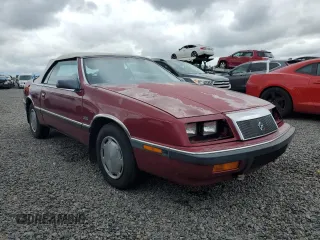 1989 Chrysler LeBaron z VIN 1C3XJ45J8KG223051, wystawiony jako Copart lot #75115464 z przebiegiem 27 923 mil mil oraz Szkody całkowita. Historia ofert i sprzedaży dostępna na DreamBid. Obrazek 4.