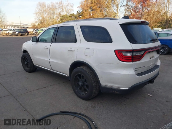 2015 Dodge Durango SXT with VIN 1C4RDJAG1FC745974, listed as a IAAI auction lot 41392820 with 124,861 mi miles and . Bid and sale history available at DreamBid. Image 3.