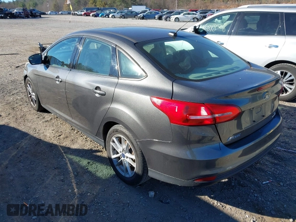 2015 Ford Focus SE with VIN 1FADP3F26FL280298, listed as a IAAI auction lot 40852000 with 144,805 mi miles and . Bid and sale history available at DreamBid. Image 3.