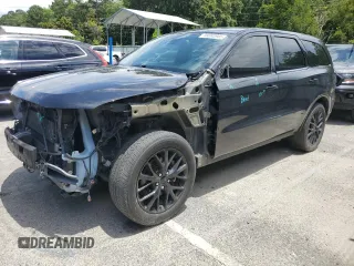 2015 Dodge Durango R/T with VIN 1C4SDHCT3FC907348, listed as a Copart auction lot 59880905 with 141,162 mi miles and Salvage title. Bid and sale history available at DreamBid. Image 1.