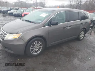 2012 Honda Odyssey EX-L with VIN 5FNRL5H64CB037689, listed as a IAAI auction lot 41857822 with 121,601 mi miles and . Bid and sale history available at carsss.com. Image 18.