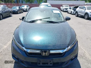 2018 Honda Clarity z VIN JHMZC5F19JC012951, wystawiony jako IAAI lot #42404688 z przebiegiem 213 122 mil mil oraz . Historia ofert i sprzedaży dostępna na DreamBid. Obrazek 12.