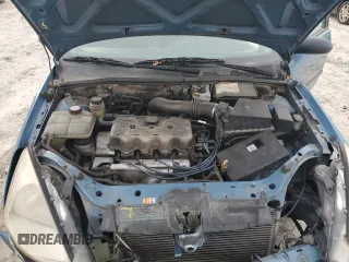 2001 Ford Focus LX with VIN 1FAHP33P01W332260, listed as a Copart auction lot 83221654 with 104,028 mi miles and Salvage Title. Bid and sale history available at DreamBid. Image 11.