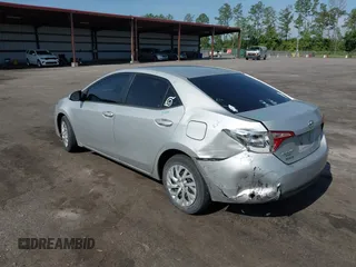 2018 Toyota Corolla L with VIN 5YFBURHEXJP810003, listed as a IAAI auction lot 42526648 with 84,546 mi miles and . Bid and sale history available at DreamBid. Image 3.