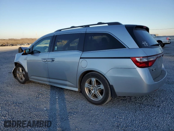 2012 Honda Odyssey Touring with VIN 5FNRL5H9XCB027758, listed as a Copart auction lot 86058504 with 164,860 mi miles and Salvage Title. Bid and sale history available at DreamBid. Image 2.