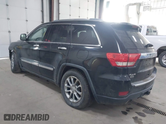 2013 Jeep Grand Cherokee Overland with VIN 1C4RJFCT7DC524005, listed as a IAAI auction lot 42116097 with 126,942 mi miles. Bid and sale history available at carsss.com. Image 3.