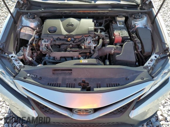 2018 Toyota Camry LE z VIN 4T1B11HK4JU053856, wystawiony jako Copart lot #61017095 z przebiegiem 134 977 mil mil oraz Szkoda całkowita • Salvage title. Historia ofert i sprzedaży dostępna na DreamBid. Obrazek 11.