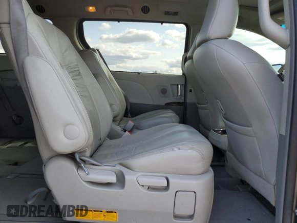 2011 Toyota Sienna XLE with VIN 5TDDK3DC2BS028058, listed as a Copart auction lot 54374215 with 216,905 mi miles and Salvage Title. Bid and sale history available at DreamBid. Image 11.