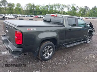 2018 Chevrolet Colorado 4WD Z71 with VIN 1GCGTDEN3J1184203, listed as a IAAI auction lot 42250291 with 72,972 mi miles and . Bid and sale history available at DreamBid. Image 4.