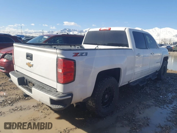 2018 Chevrolet Silverado 1500 LT with VIN 1GCUKRECXJF198247, listed as a Copart auction lot 49496595 with 81,408 mi miles and Salvage Title. Bid and sale history available at DreamBid. Image 3.