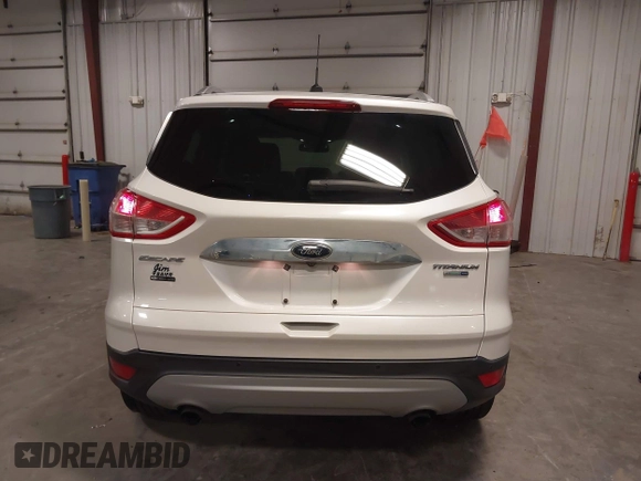 2016 Ford Escape Titanium with VIN 1FMCU9J99GUA61848, listed as a IAAI auction lot 42300324 with 51,692 mi miles and . Bid and sale history available at DreamBid. Image 16.