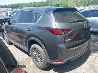 2017 Mazda CX-5 Touring with VIN JM3KFACL5H0197432, listed as a IAAI auction lot 42060117 with 1 mi miles. Bid and sale history available at carsss.com. Image 3.
