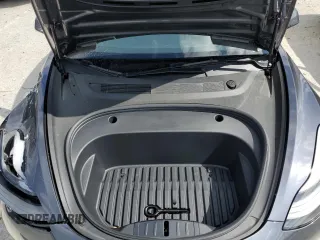2023 Tesla Model 3 z VIN 5YJ3E1EA0PF677471, wystawiony jako Copart lot #57661625 z przebiegiem 20 326 mil mil oraz Szkoda całkowita • Salvage title. Historia ofert i sprzedaży dostępna na DreamBid. Obrazek 11.