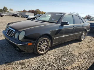 2002 Mercedes-Benz E-Class with VIN WDBJF70J82B492531, listed as a Copart auction lot 77485094 with 85,750 mi miles and Salvage Title. Bid and sale history available at carsss.com. Image 1.