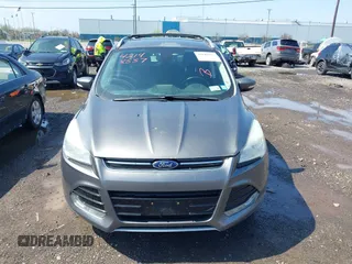 2014 Ford Escape Titanium with VIN 1FMCU9J99EUA75276, listed as a IAAI auction lot 42148537 with 163,330 mi miles and . Bid and sale history available at DreamBid. Image 12.