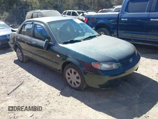 2002 Mazda Protege DX with VIN JM1BJ225121601070, listed as a IAAI auction lot 41650083 with 169,662 mi miles and . Bid and sale history available at DreamBid. Image 1.