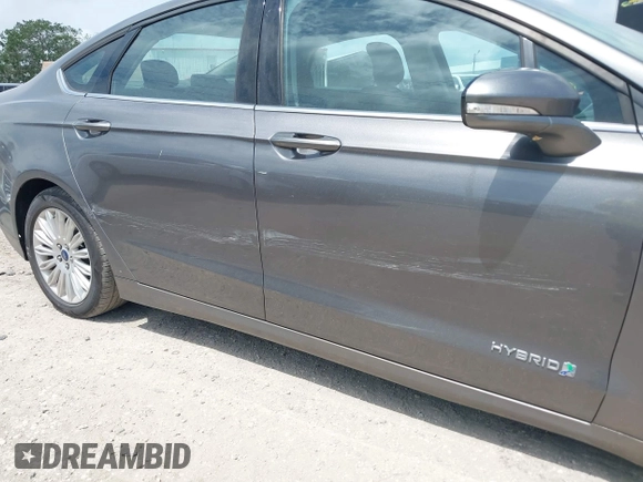 2013 Ford Fusion SE Hybrid with VIN 3FA6P0LU3DR338282, listed as a IAAI auction lot 41973498 with 187,375 mi miles. Bid and sale history available at carsss.com. Image 12.