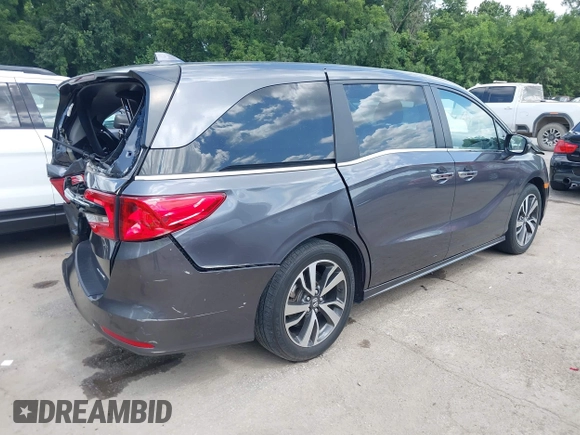 2022 Honda Odyssey Touring with VIN 5FNRL6H89NB008814, listed as a IAAI auction lot 42597738 with 49,933 mi miles and . Bid and sale history available at DreamBid. Image 4.