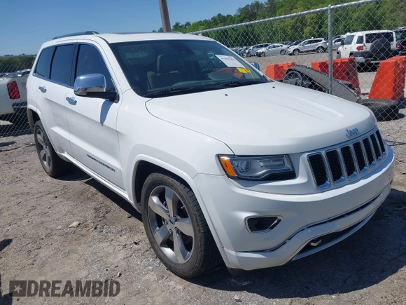 2015 Jeep Grand Cherokee Overland with VIN 1C4RJECG6FC707458, listed as a IAAI auction lot 41996350 with 128,307 mi miles and . Bid and sale history available at DreamBid. Image 1.