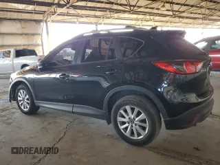 2014 Mazda CX-5 Touring with VIN JM3KE2CY4E0379574, listed as a Copart auction lot 48509655 with 178,102 mi miles and Salvage Title. Bid and sale history available at DreamBid. Image 2.