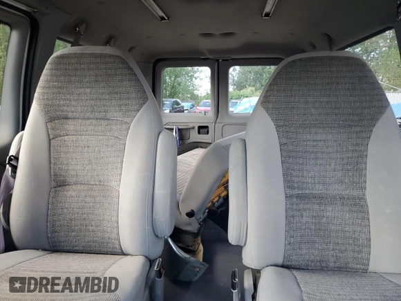 2002 Ford Econoline Passenger XL with VIN 1FMRE11WX2HA57114, listed as a Copart auction lot 68766174 with 167,382 mi miles and Salvage Title. Bid and sale history available at DreamBid. Image 10.