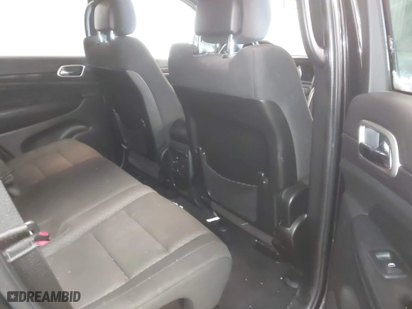 2018 Jeep Grand Cherokee Laredo E with VIN 1C4RJFAG3JC334865, listed as a IAAI auction lot 41599796 with 127,591 mi miles. Bid and sale history available at carsss.com. Image 8.