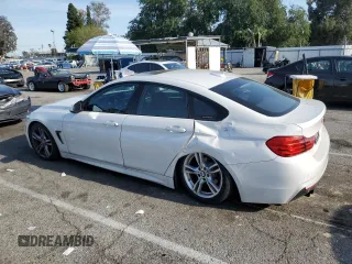 2015 BMW 4 Series 428i with VIN WBA4A9C59FGL87249, listed as a Copart auction lot 52182775 with 57,797 mi miles and Salvage title. Bid and sale history available at DreamBid. Image 2.